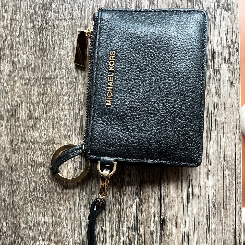 Black and gold Michael Kors wristlet/wallet